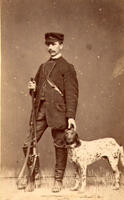 [Hunter with gun and dog]