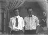 [Single portrait of two young Men standing]