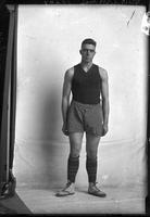 Single portrait of a young Man, Voyles, in Basketball Uniform holding a Basketball