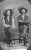 [Two cowboys in Pancho Villa hats]