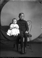 [Single portrait of a young Boy and an Infant]