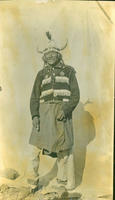 [Elderly Ute man with buffalo horn headdress and beaded vest]