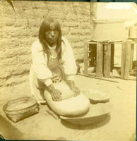Pima Squaw Grinding Wheat, April 1902