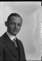 Single portrait of a young Man, Jack Drummond, sitting