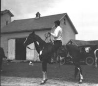 Will Rogers roping at Fred Stones Amityville, Long Island, N.Y.