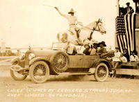 "Chief" (owned by Leonard Stroud) Jumping over Loaded Automobile