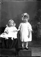 [Single portrait of a young Girl and Infant]