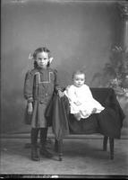 [Single portrait of a Girl and an Infant]