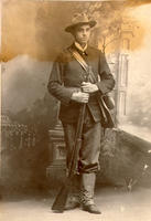 [Standing portrait of infantry trooper wearing uniform holding a Springfield rifle]