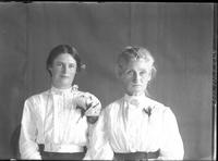 [Single portrait of two Females, one young & one aged]