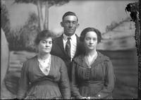 [Single portrait of three people]