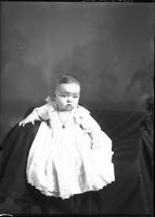 [Single portrait of an Infant in a chair]