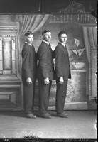 [Single portrait of three young Men standing]