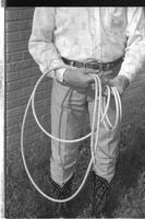 [Junior Eskew showing proper handling of coiled rope]