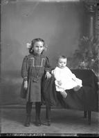 [Single portrait of a Girl and an Infant]