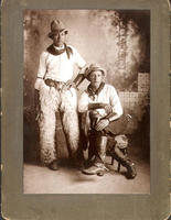 [two Native Americans in posed photograph]