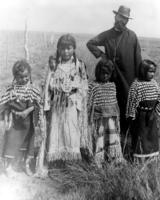 Father Isidore and Kiowa girls