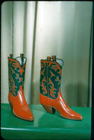 [Red boots with red and green pattern]