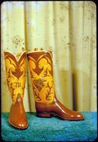 [Brown boots with tan pattern]