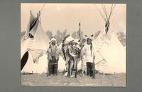 [Black Foot, Standing Bear, and Big Eagle in front of tipis]