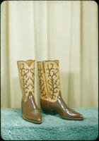 [Brown boots with tan pattern]