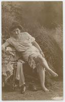 [Woman in camisole in a provocative pose in faux outdoor setting] 605/13