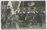 [Costumed women in horse-drawn wagon]