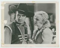 [A Serious Tom Mix and his leading Lady]