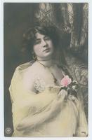 [Woman posed in lacy dress with sheer shawl and large corsage] 460/4