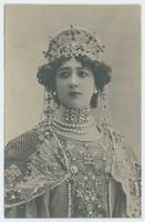 [Woman posed in beaded and pearled gown with tiara]