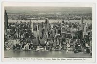 Aerial view of Mid-New York, Empire, Chrysler, Radio City bldgs.