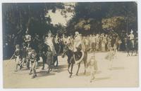 [Horses in parade with costumed riders]