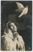 [Woman posed in religious robes with prop dove] 431/1
