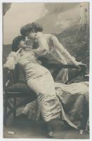 [Two women posed together on a settee] 1336/5