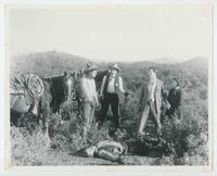 [Mix and sheriff and others stand over body of man in "The Texan"]