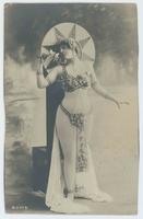 [Woman posed in Mata Hari-style harem costume]