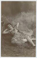 [Woman posed in ruffled and sequined dress in faux outdoor setting] 605/1