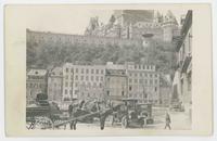 [Chateau Frontenac with old buildings, horse-drawn carts, and automobiles]