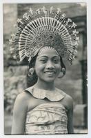 [Smiling woman in Balinese costume]