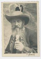 [German man with pipe in traditional clothing]