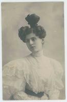 [Woman posed with unusual hairstyle]