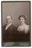[cabinet card portrait of a woman and a man]