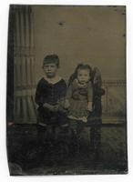 [portrait photograph of a little boy and girl]