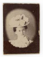 [photograph of a woman in a fancy hat]
