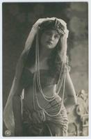 [Woman posed in harem costume with pearls] 635/2