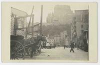 [Chateau Frontenac with horse-drawn carts]