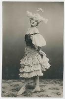 [Woman posed in ruffled and sequined dress with interesting hairstyle] 422/5