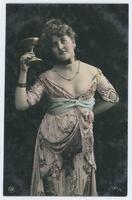[Woman posed in sequined dress with goblet] 795/6