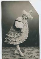 [Woman posed in ruffled and sequined dress with interesting hairstyle] 422/1