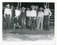 [David Shellenberger and 10 other cowboys in a group portrait